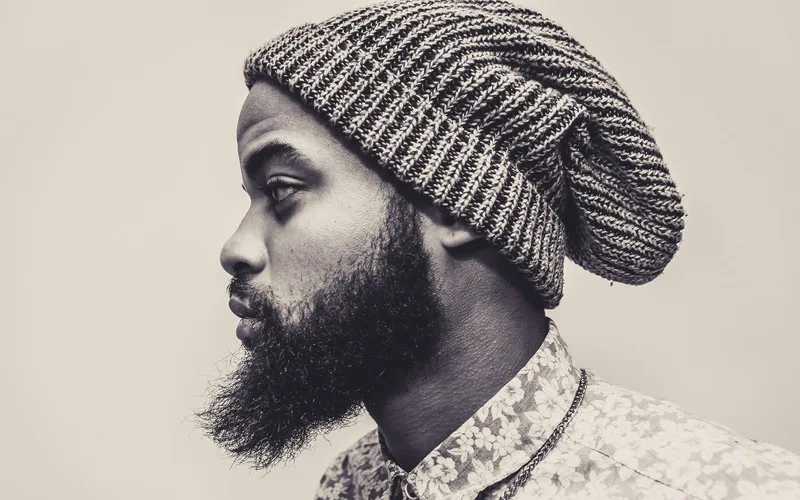 Sharp, professionally groomed beard maintained between barber visits with proper beard maintenance routine