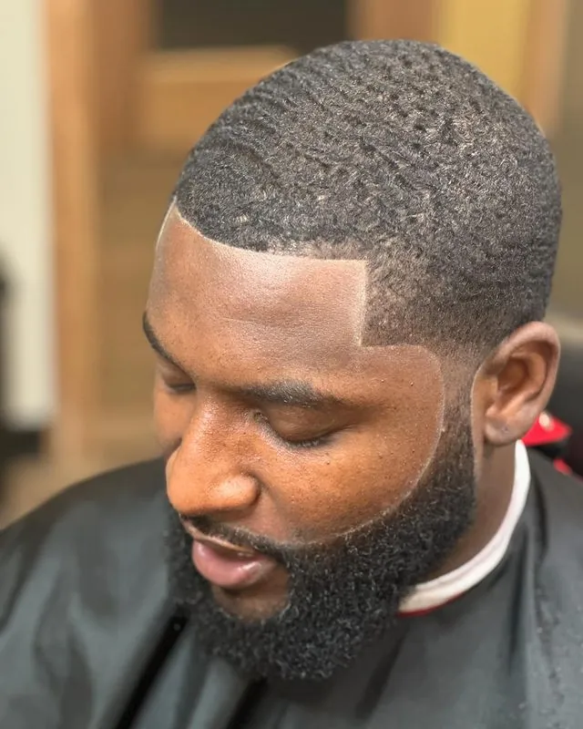 Waves with a squared lineup by Clifton Bey at Al-Hakeem's Tonsorial